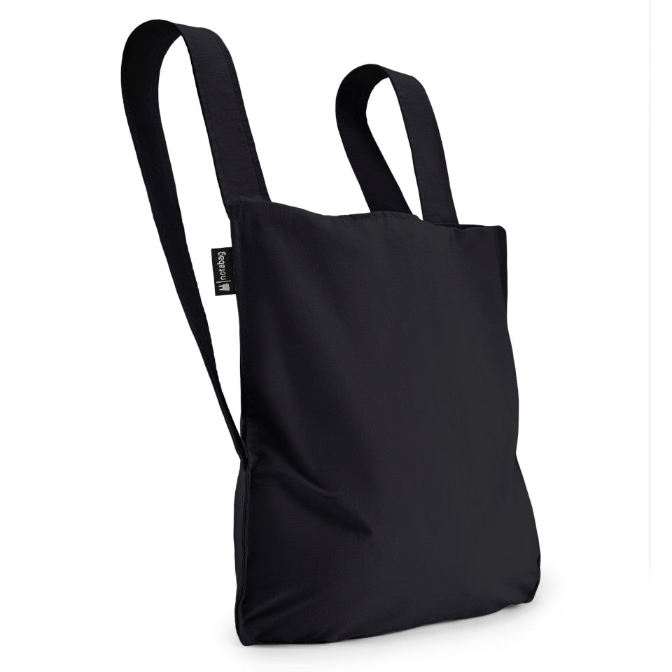 Not-a-bag re-usable fold-away pouch, black, shown as backpack.