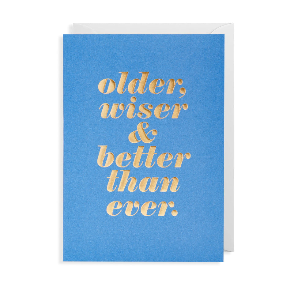 Older, wiser & better than ever., blank birhday card, gold lettering on a blue background, with white envelope.