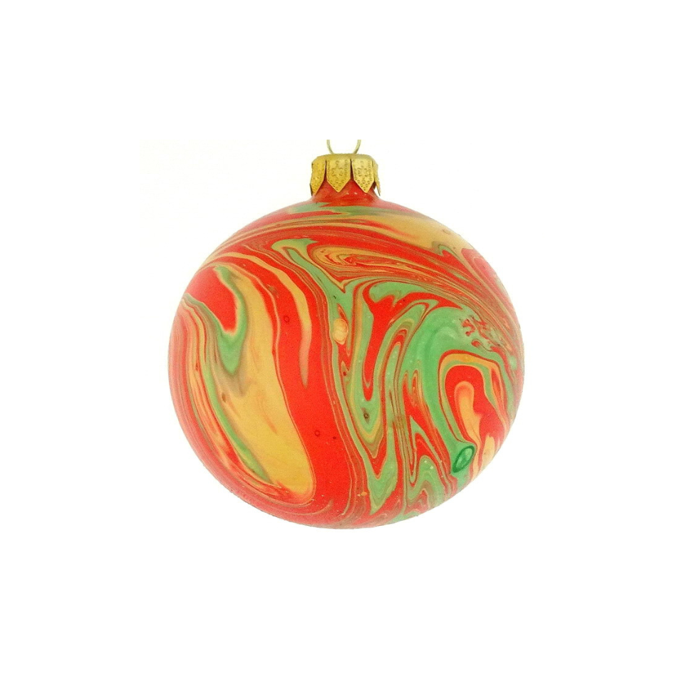 Decorative ball ornament with red, green, and yellow swirl pattern on a white background
