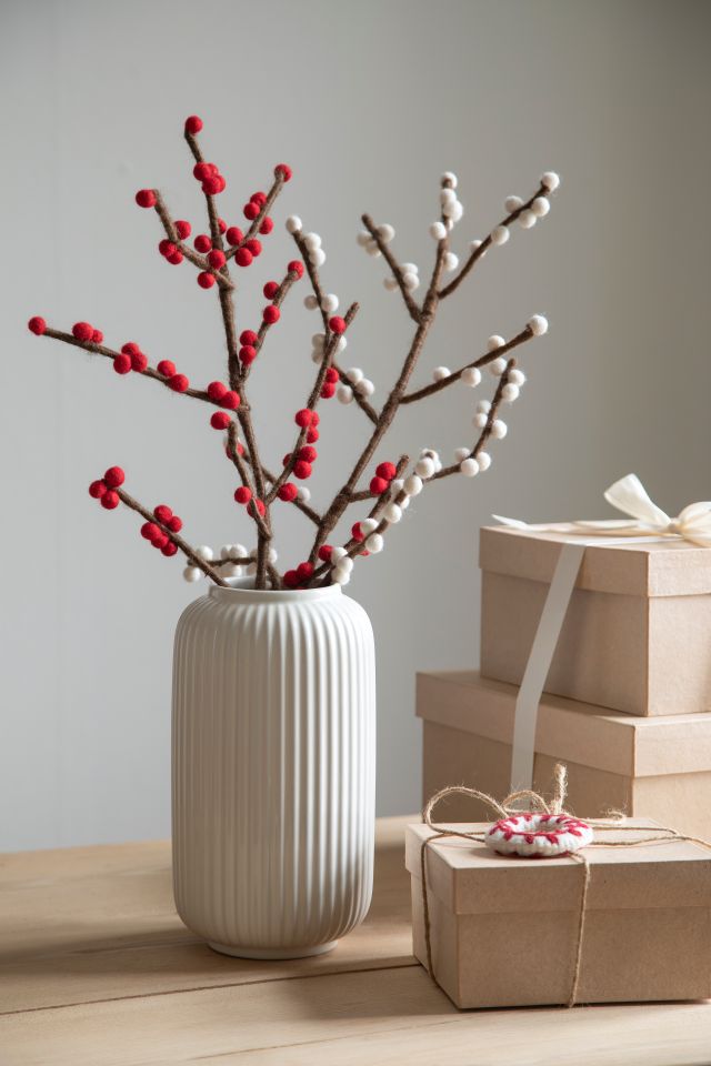 Vase with felt branches in red and white