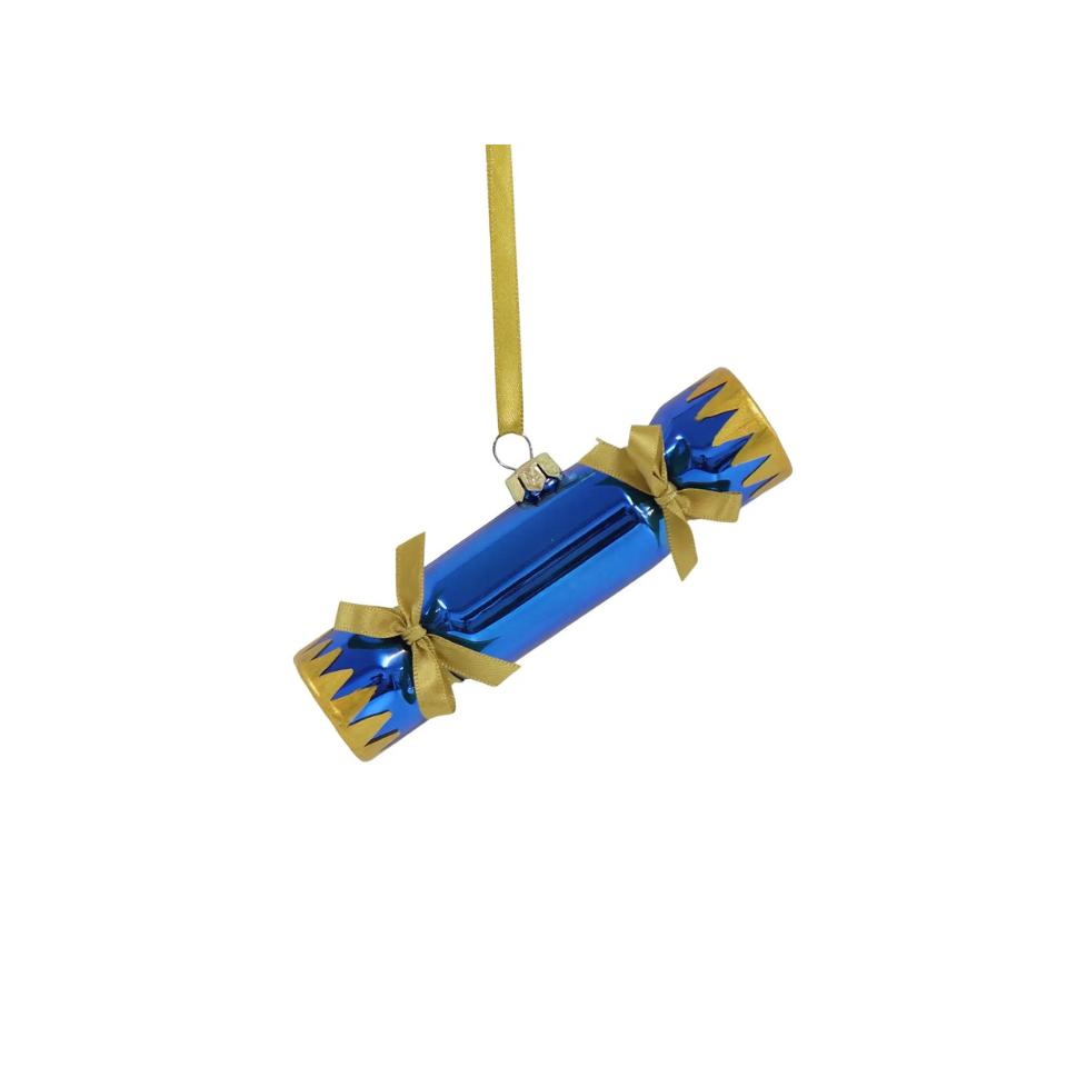 Tree decoration of a Blue Christmas cracker with gold ribbon on a white background