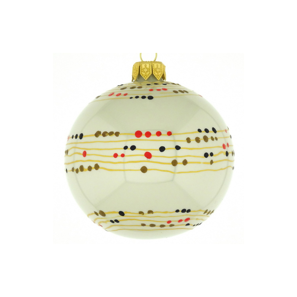 Decorative Christmas ball ornament with musical notes and colored dots on a white background