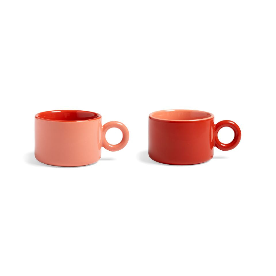 Two Red and Pink mugs on a white background