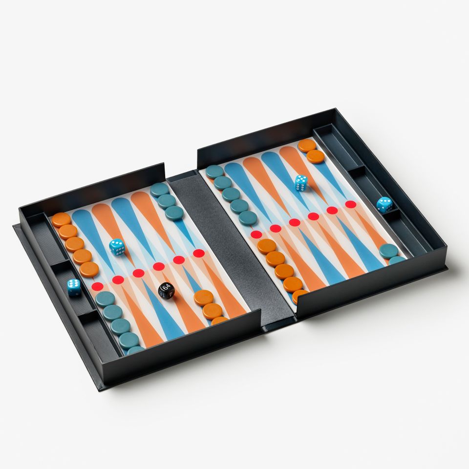 Backgammon board with pieces on a white background