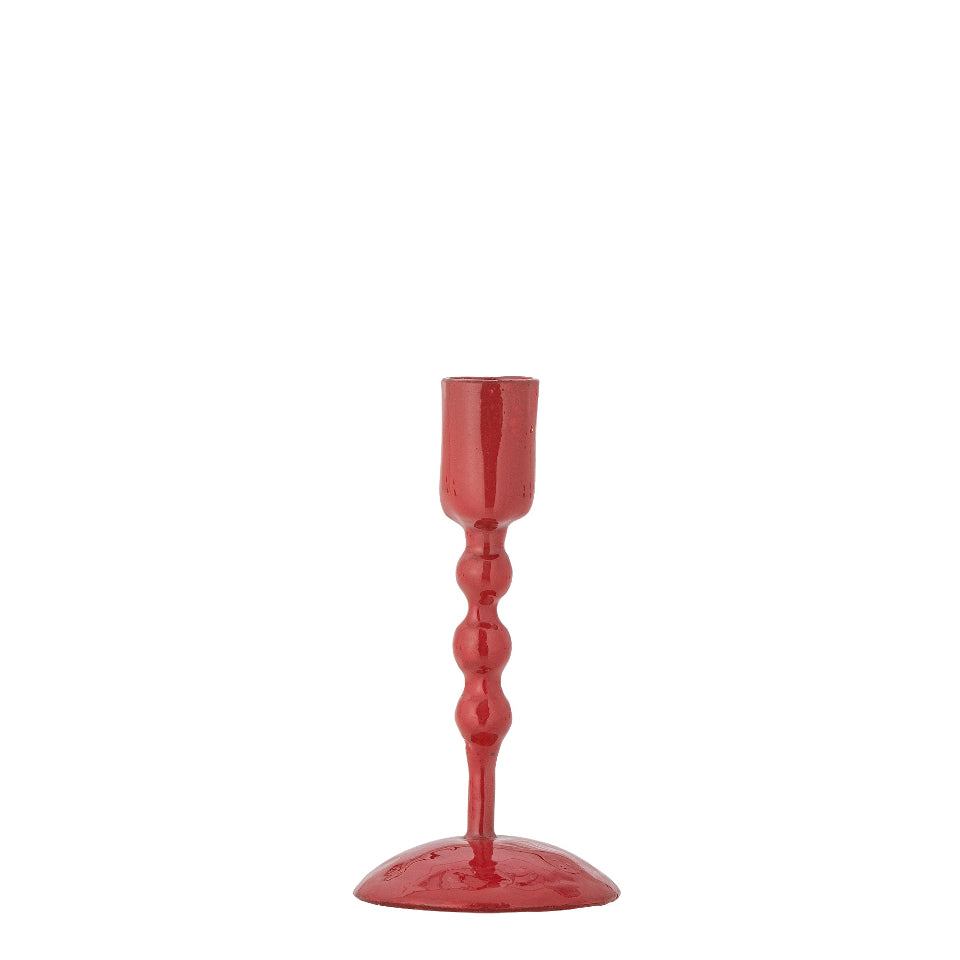 Red candle holder on a white background