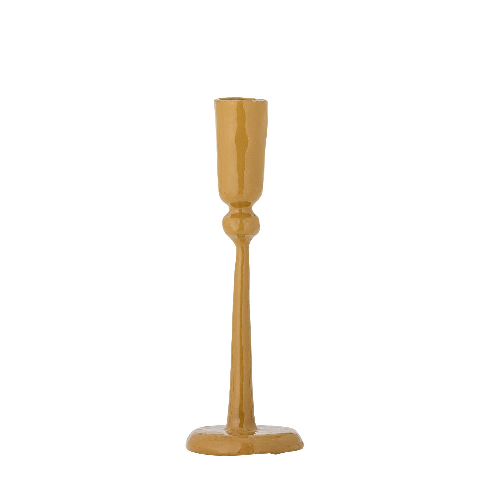 Yellow candle holder on a white background