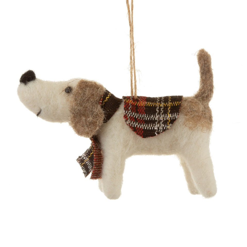 Dog-shaped ornament with a scarf on a white background