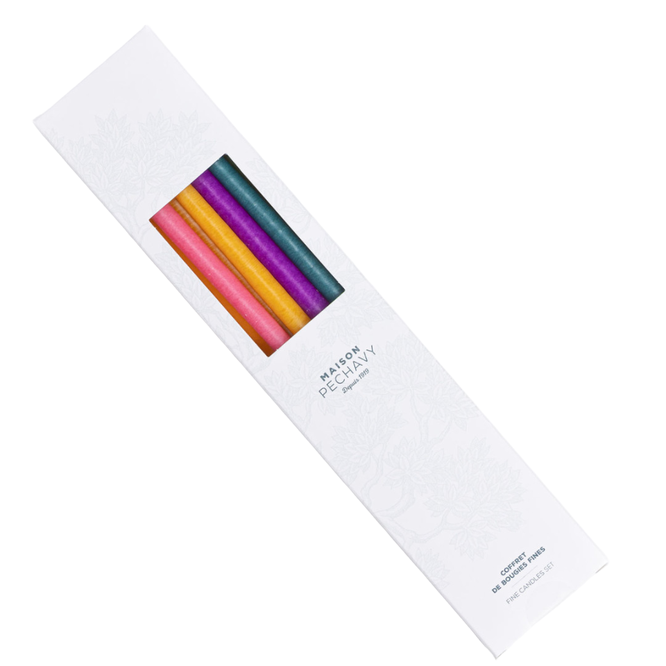 Box of fine taper candles in bright shades of pink, yellow, purple and blue.