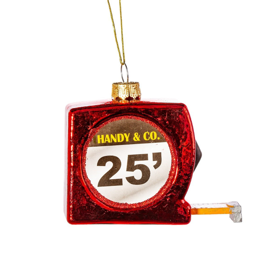Decorative tape measure ornament with 'Handy & Co.' branding on a white background