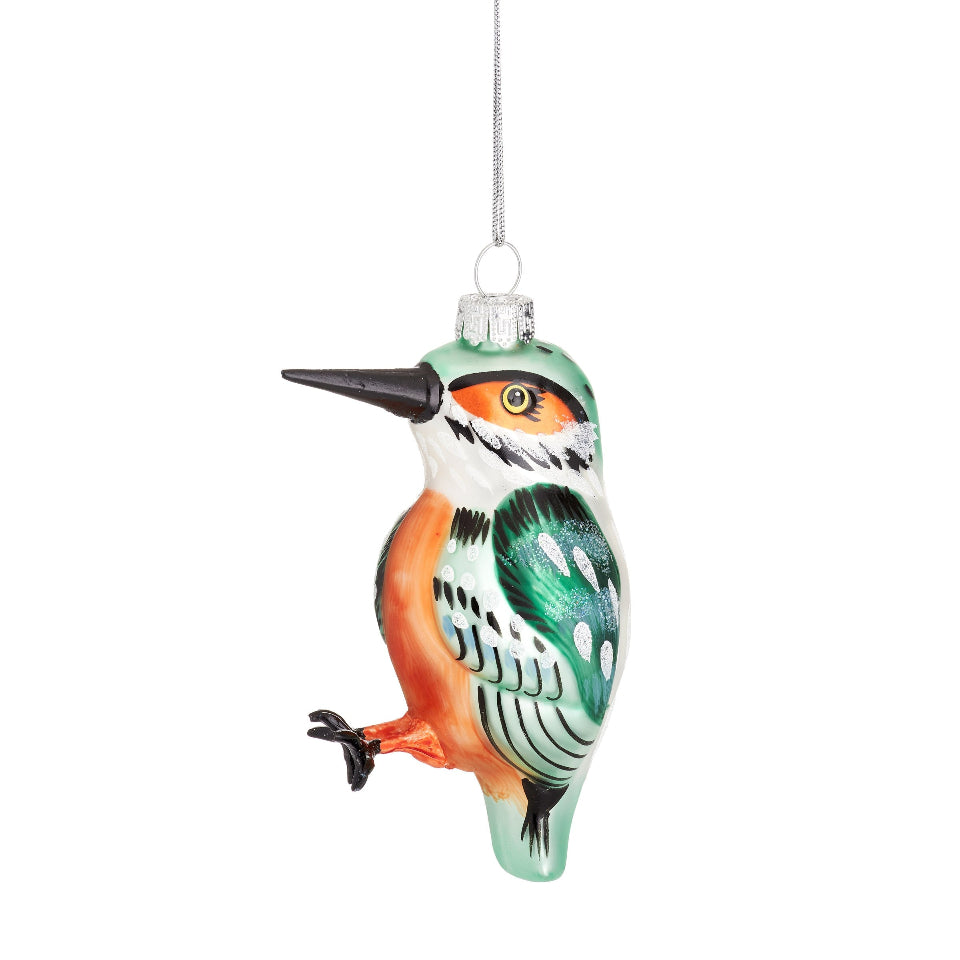 Decorative glass bird ornament on a white background