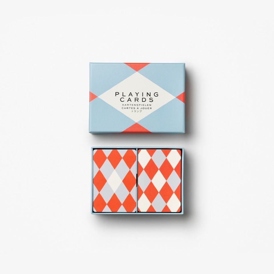 Playing cards with geometric design on a white background