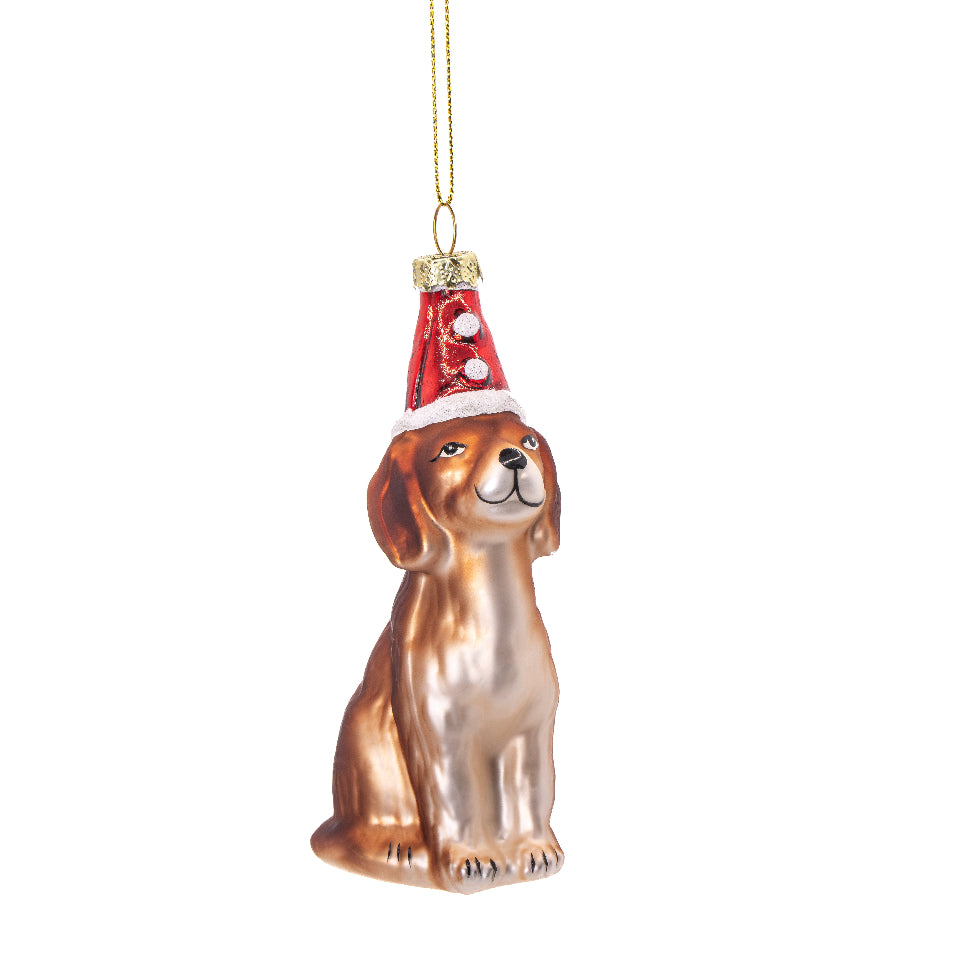 Puppy dog in a santa hat tree decoration