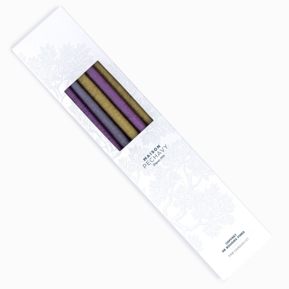 Box of fine taper candles in shades of purple and green