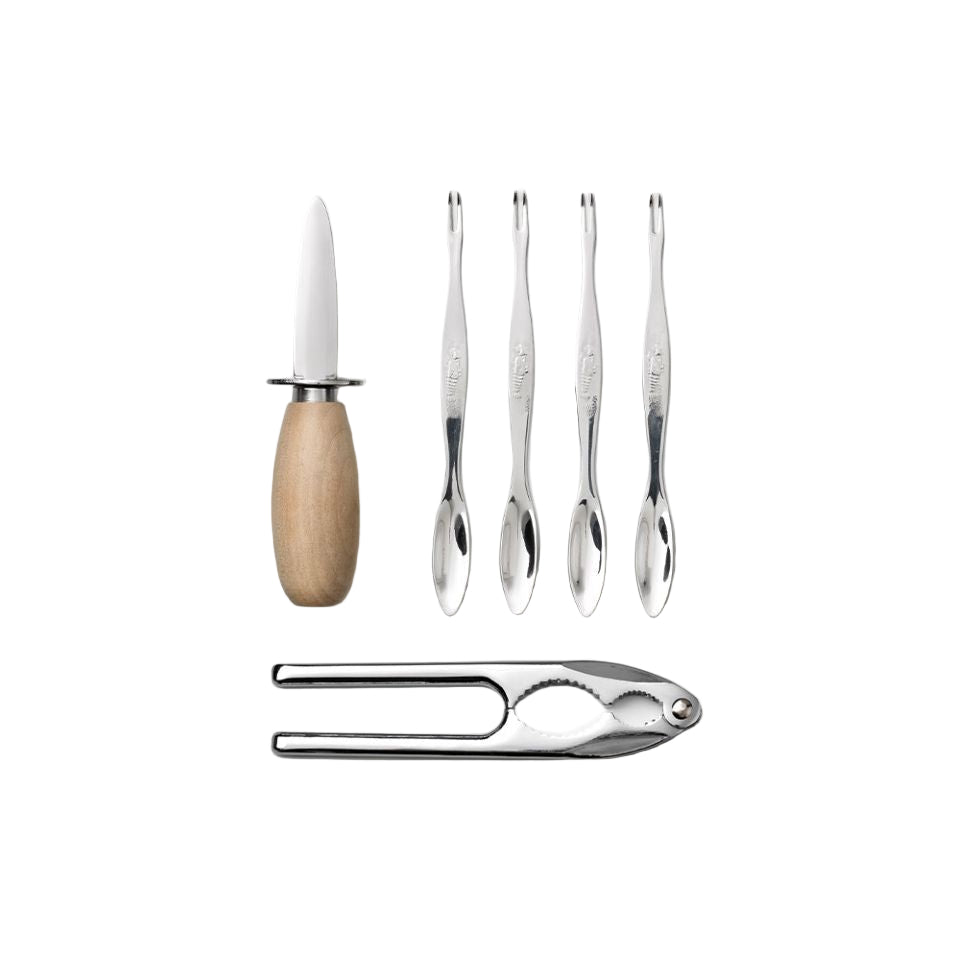 Set of kitchen utensils including a knife, tongs, and a citrus reamer on a white background