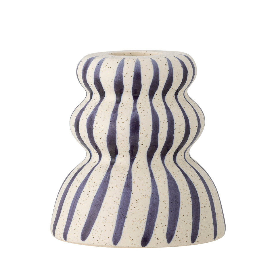 Ceramic candle holder with wavy blue stripes on a white background