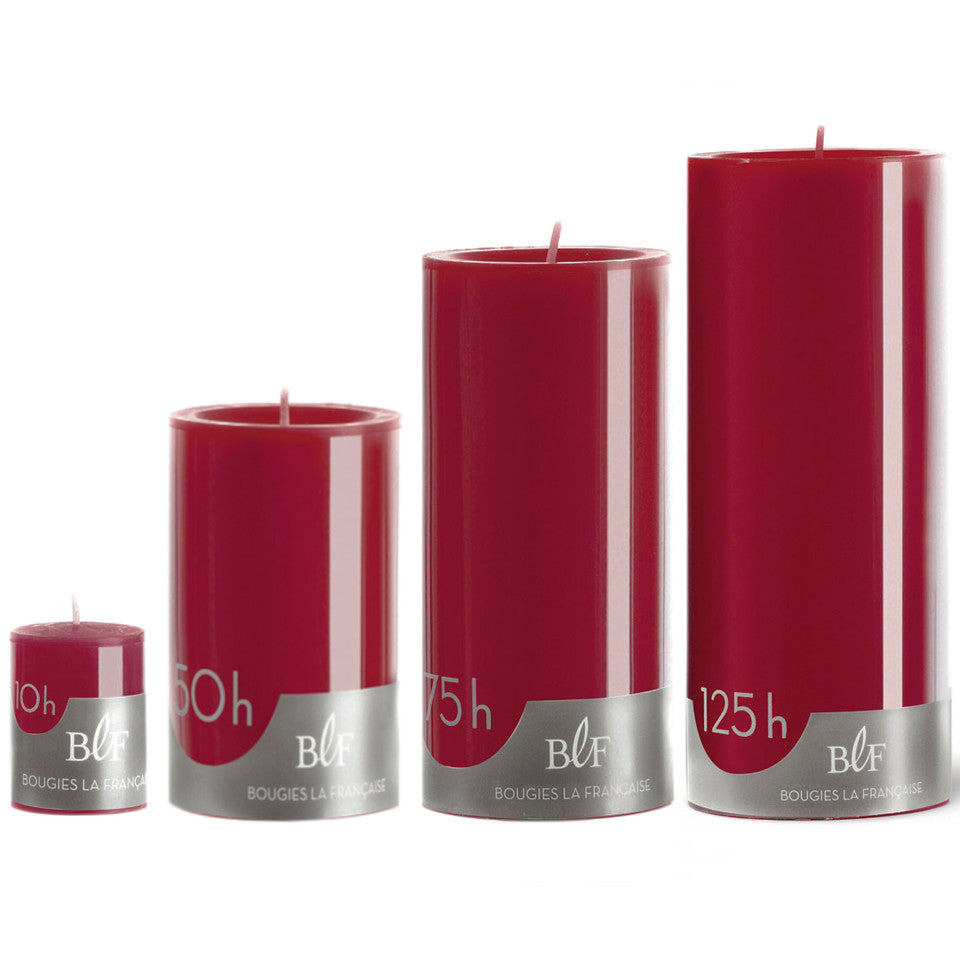 Christmas red pillar candles, l-r: votive - 10 hr, small - 50 hr, medium - 75 hr, large - 125 hr burn time.