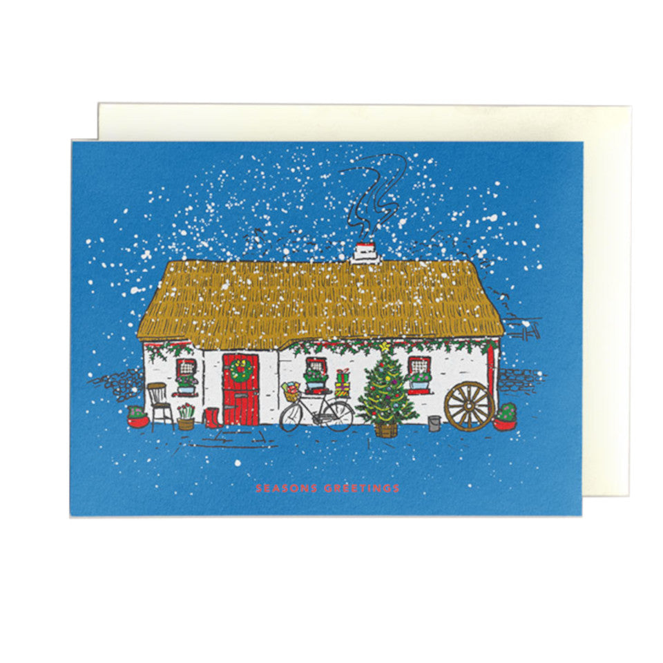 Irish thatched cottage in snowy scene, Season's Greetings, Christmas card.