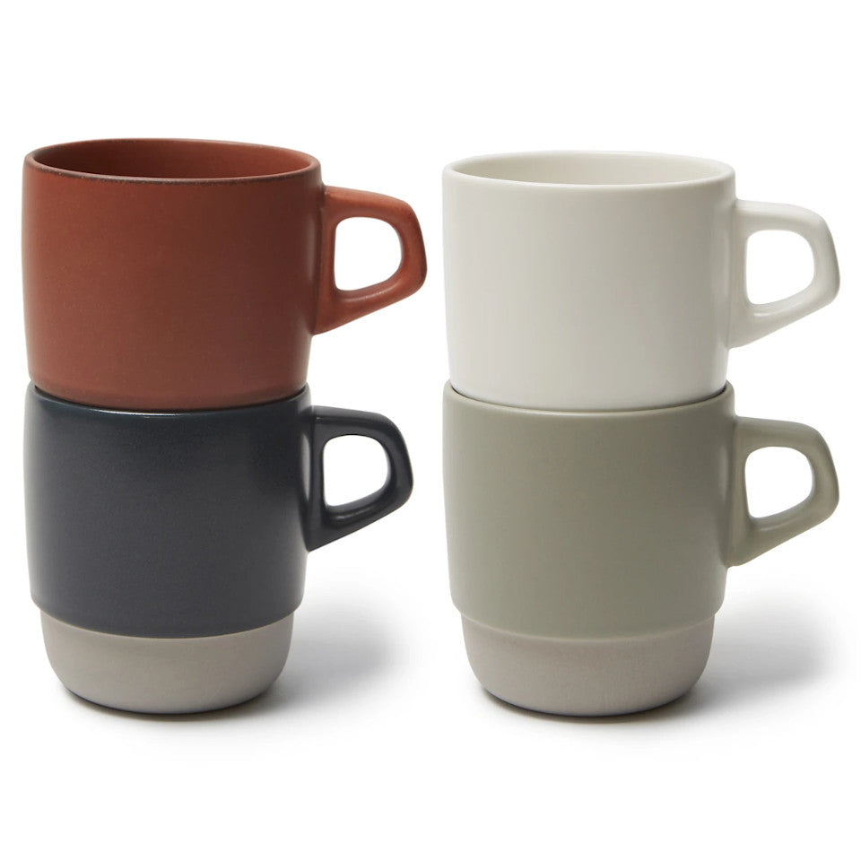 SCS stacking mugs, stacked in pairs, orange stacked in navy and white stacked in grey,